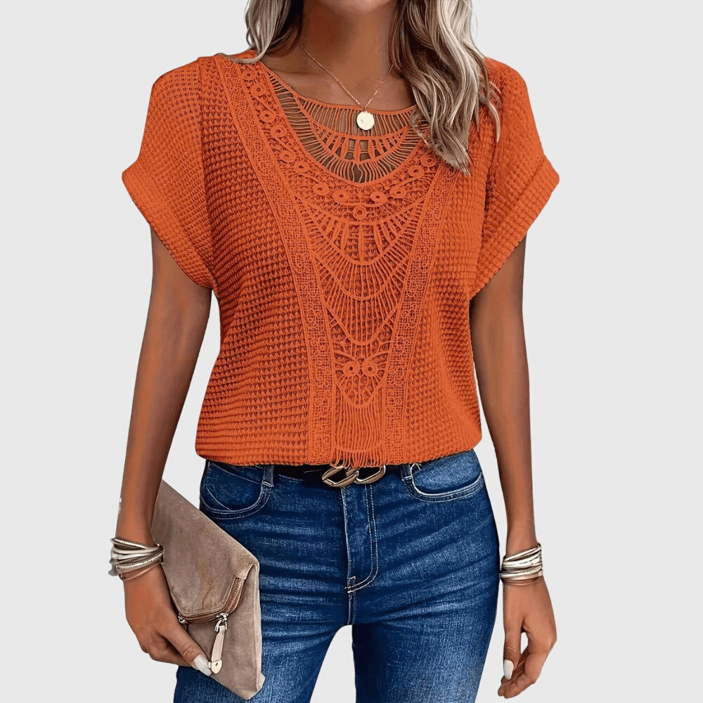 Textured perforated geometric loose top with rolled-up sleeves