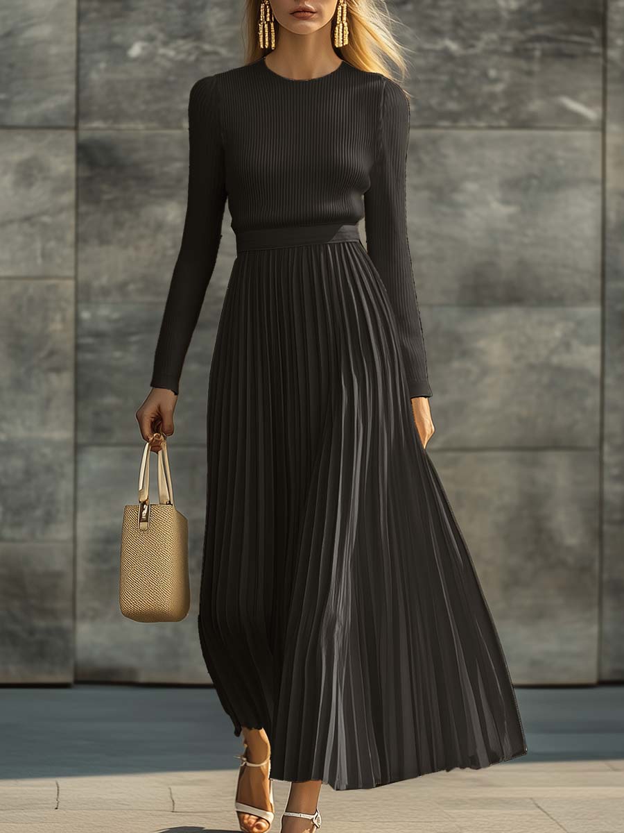 Long knitted maxi dress with a round neckline and pleats