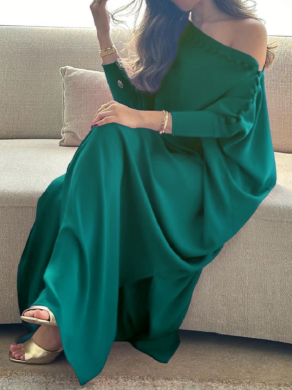 Maxi dress with an asymmetrical neckline and shoulder slit