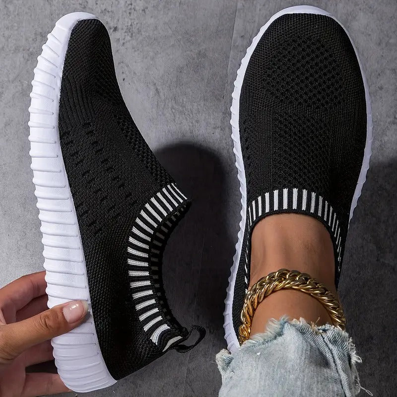 Slip-on shoes with round toes and textured ridged soles