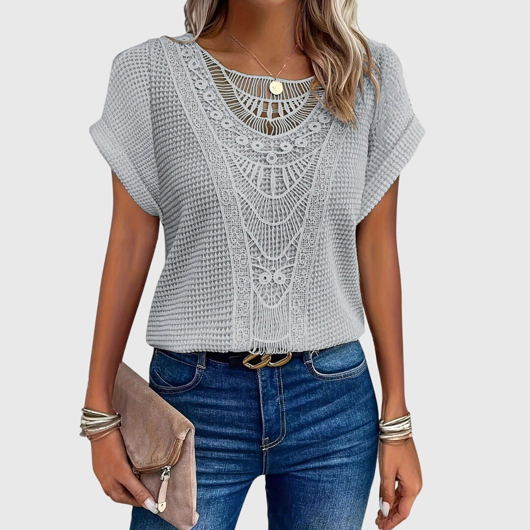 Textured perforated geometric loose top with rolled-up sleeves
