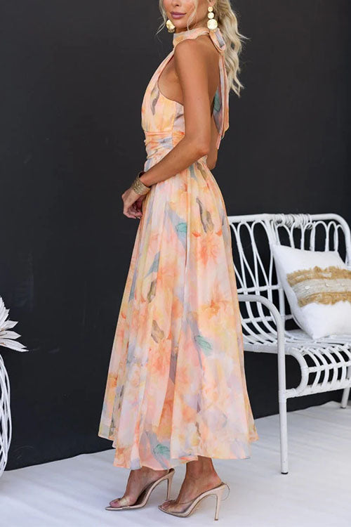 Sleeveless halter-neck maxi dress with a ruffle