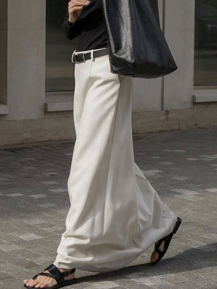 A-line maxi skirt with seam details and a belt
