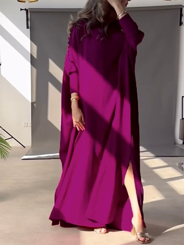Maxi dress with an asymmetrical neckline and shoulder slit