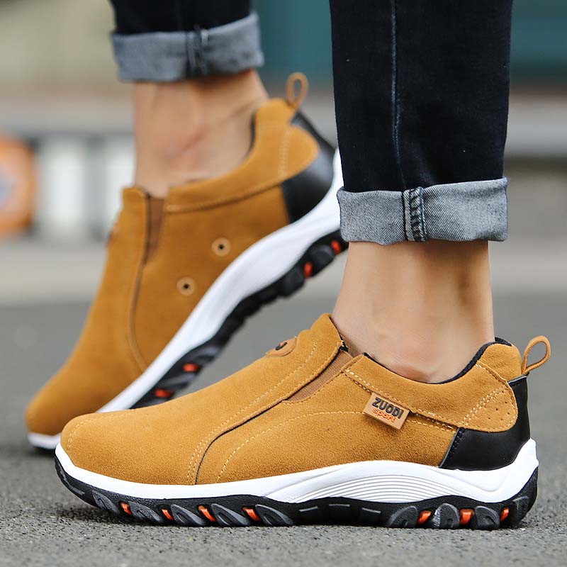 Slip-on shoes with panels and elastic inserts