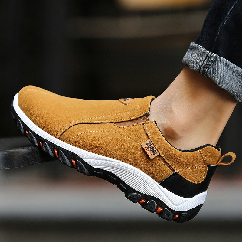 Slip-on shoes with panels and elastic inserts