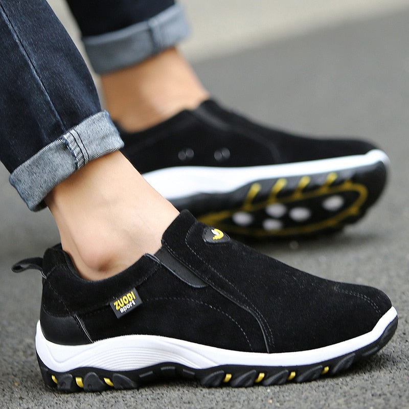 Slip-on shoes with panels and elastic inserts