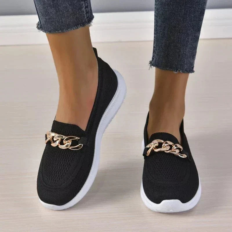 Slip-on shoes with a textured toe and chain detail