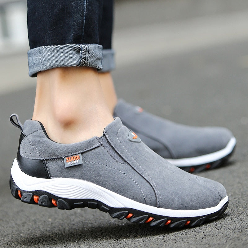 Slip-on shoes with panels and elastic inserts