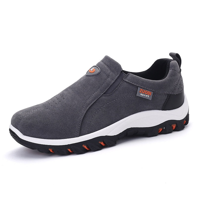 Slip-on shoes with panels and elastic inserts
