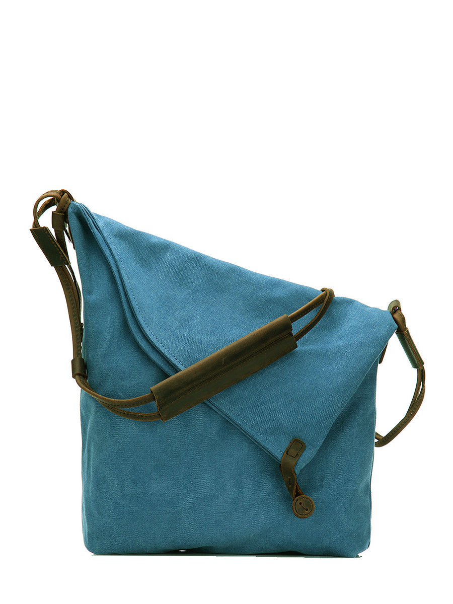 Asymmetrical folded bag with a button, adjustable and stitched