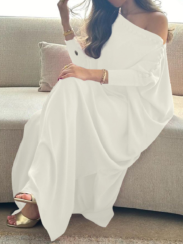 Maxi dress with an asymmetrical neckline and shoulder slit