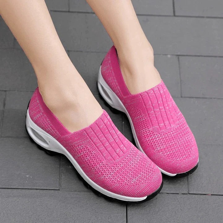 Slip-on shoes with a raised perforated upper