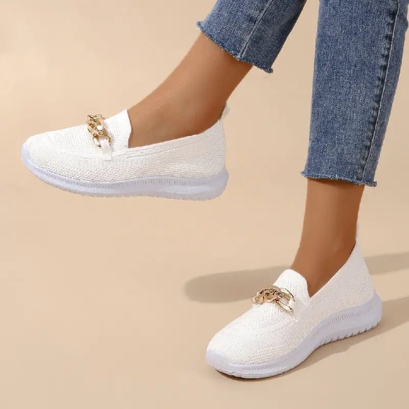 Slip-on shoes with a textured toe and chain detail