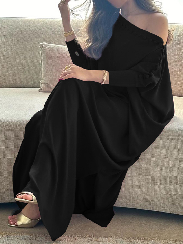 Maxi dress with an asymmetrical neckline and shoulder slit