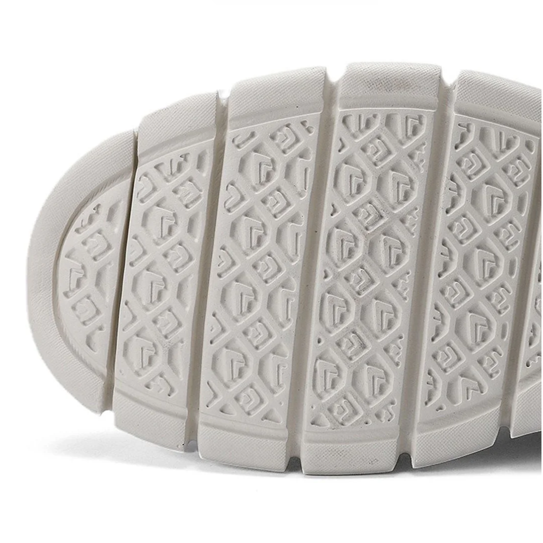 Textured low-top sneakers with panels and lacing