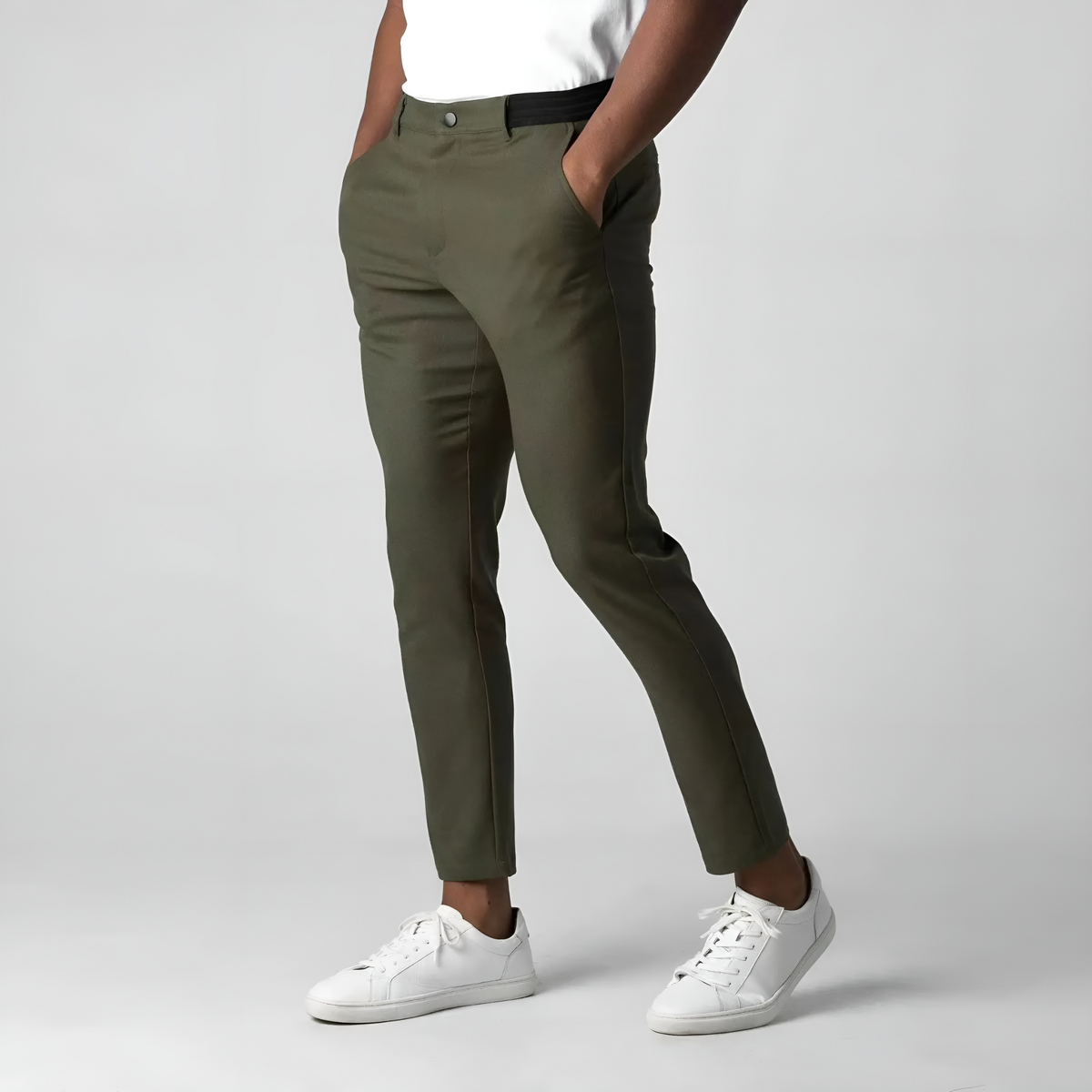 Tapered slim-fit pants with pockets, a button, and finished hems