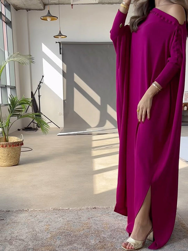 Maxi dress with an asymmetrical neckline and shoulder slit