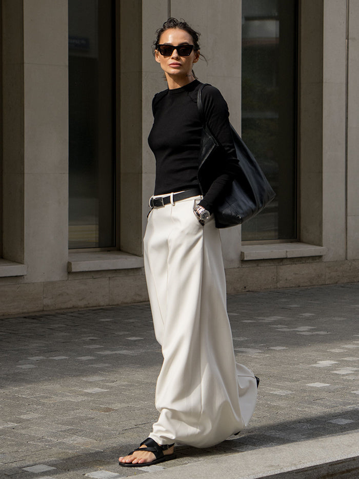 A-line maxi skirt with seam details and a belt