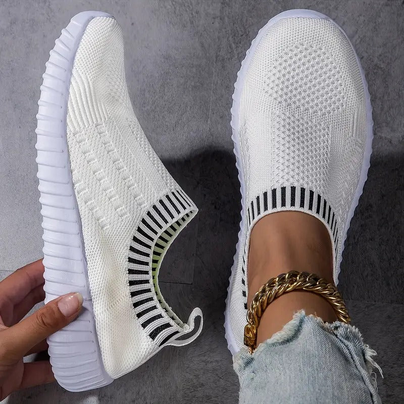 Slip-on shoes with round toes and textured ridged soles