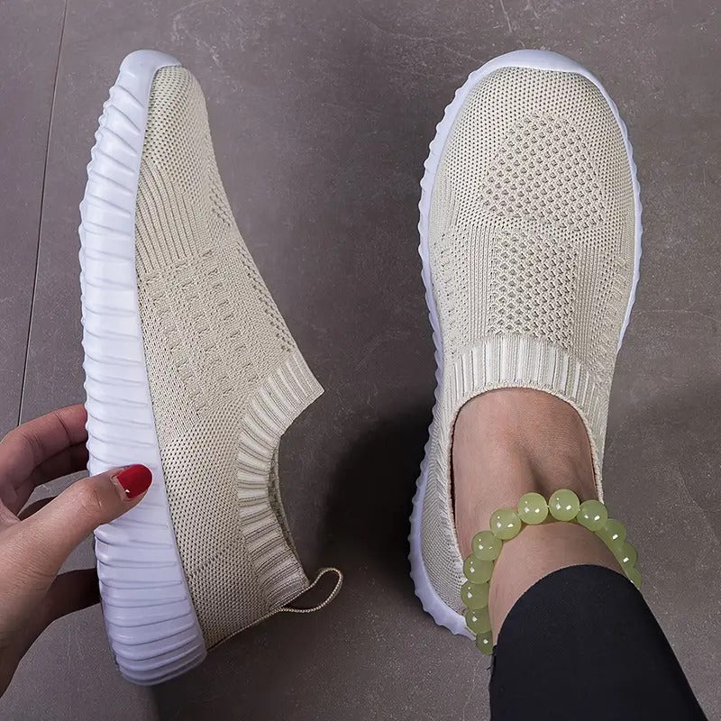 Slip-on shoes with round toes and textured ridged soles