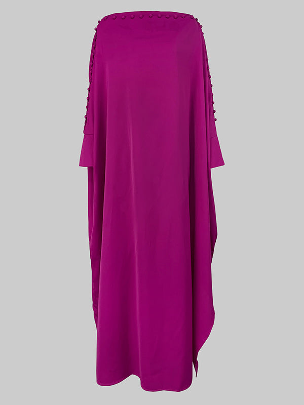 Maxi dress with an asymmetrical neckline and shoulder slit
