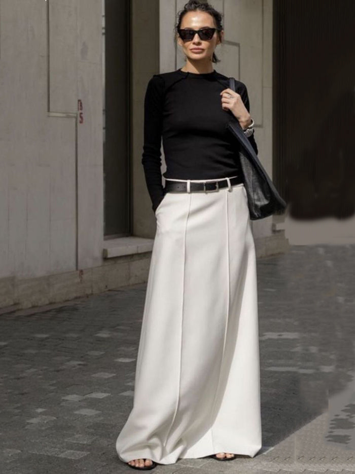 A-line maxi skirt with seam details and a belt