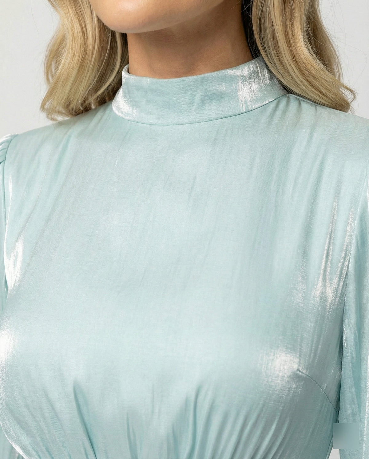 Maxi dress with ruching, pleats, cuffs, and a flared hem