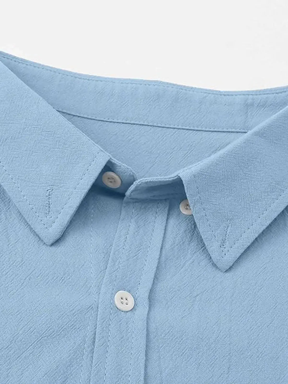 Textured rounded-fit collared shirt with button fastening and cuffs