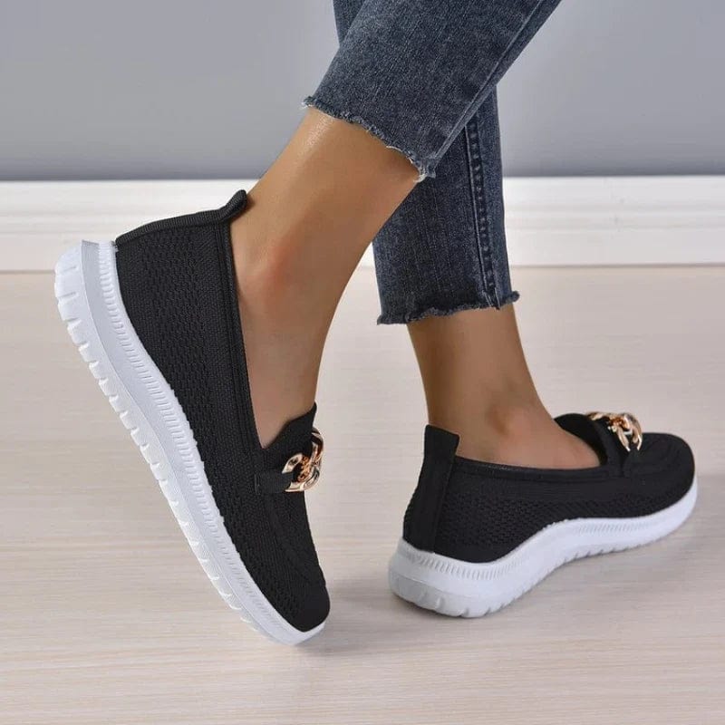 Slip-on shoes with a textured toe and chain detail