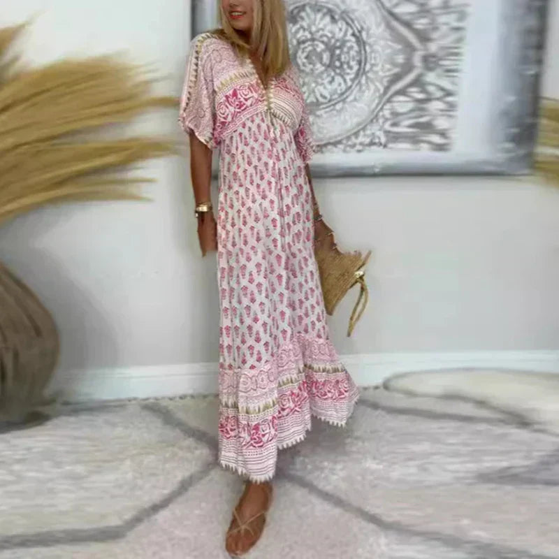 Patterned maxi dress with a layered design and fringe