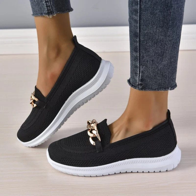 Slip-on shoes with a textured toe and chain detail