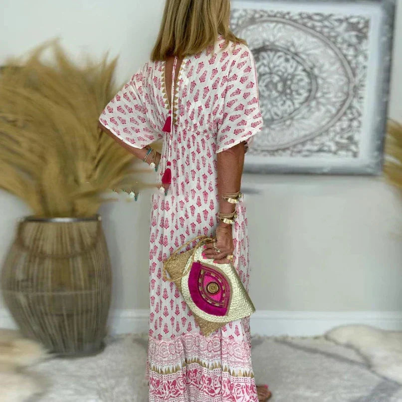Patterned maxi dress with a layered design and fringe