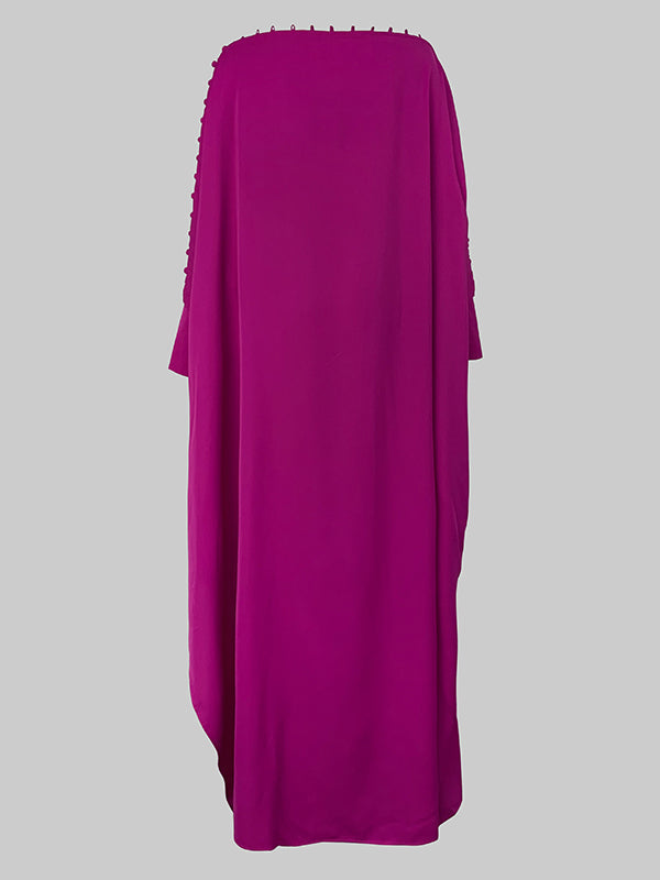 Maxi dress with an asymmetrical neckline and shoulder slit