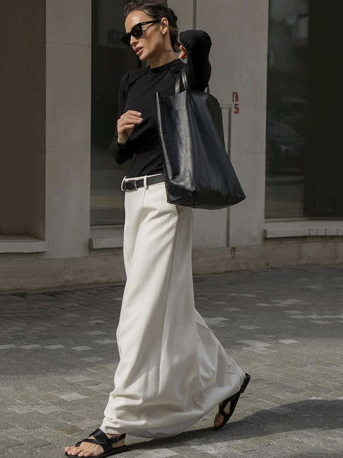 A-line maxi skirt with seam details and a belt