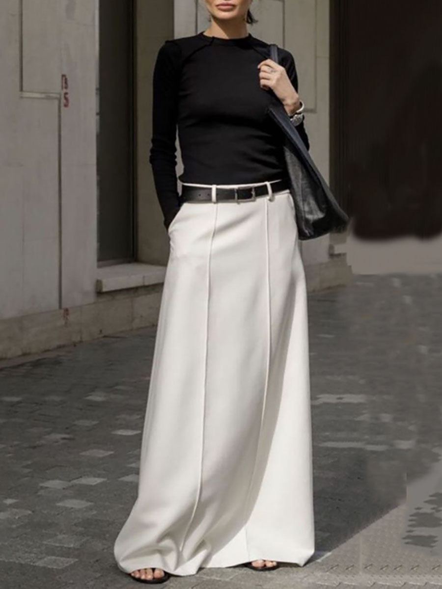 A-line maxi skirt with seam details and a belt