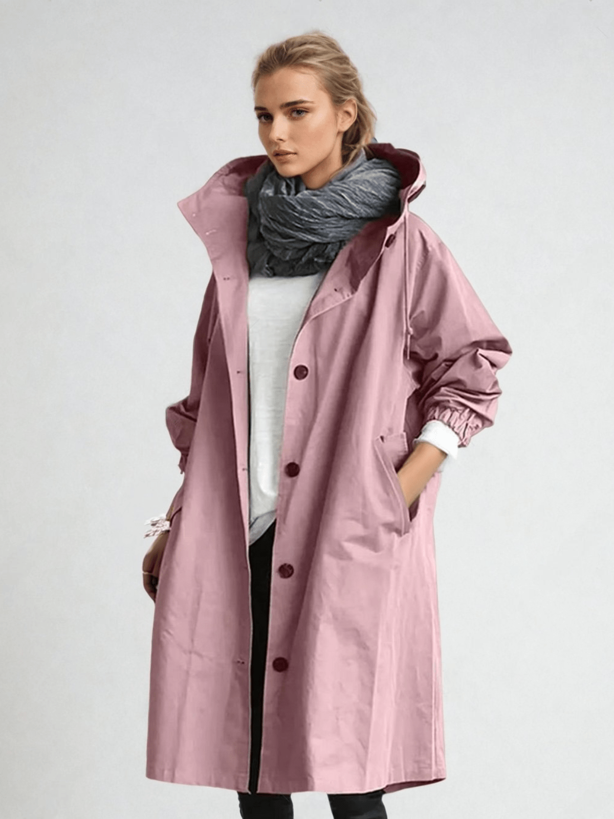 Hooded trench coat with button fastening and pockets