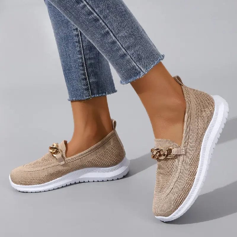 Slip-on shoes with a textured toe and chain detail