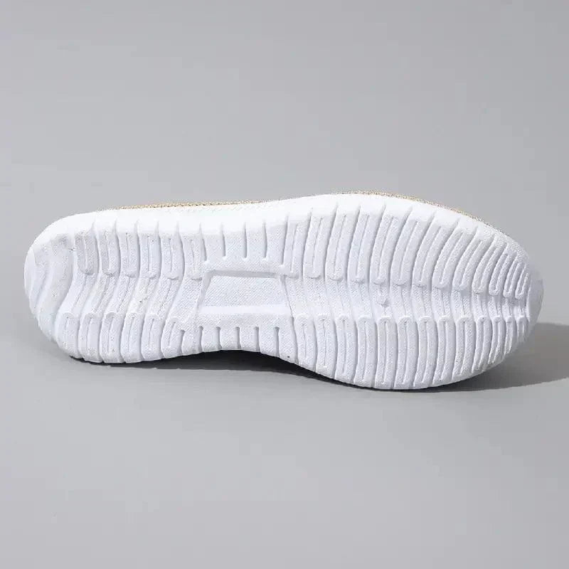 Slip-on shoes with a textured toe and chain detail