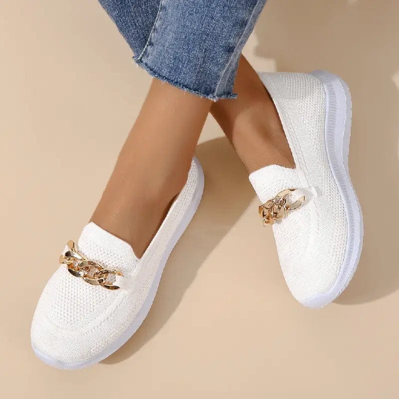 Slip-on shoes with a textured toe and chain detail