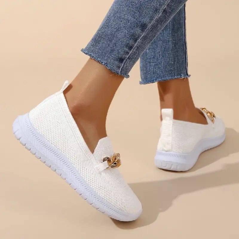 Slip-on shoes with a textured toe and chain detail